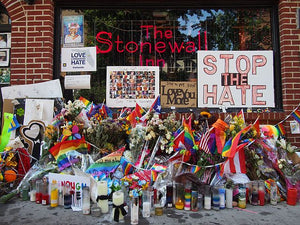 Stonewall inn with flowers and posters.