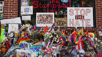 Stonewall inn with flowers and posters.